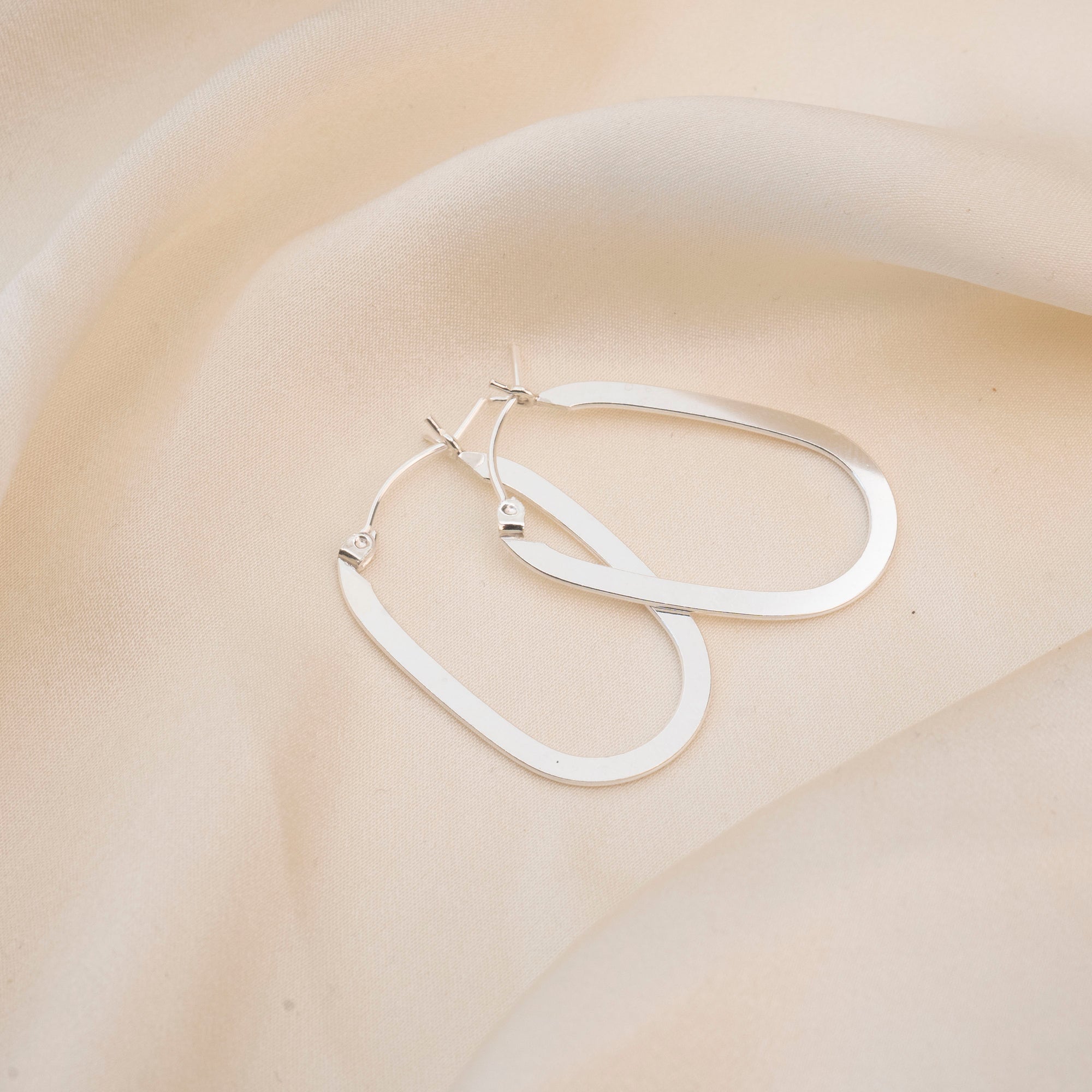 Silver Flat Shape Oval Hoops