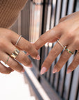 14k Gypsy Set Emerald Eternity Band