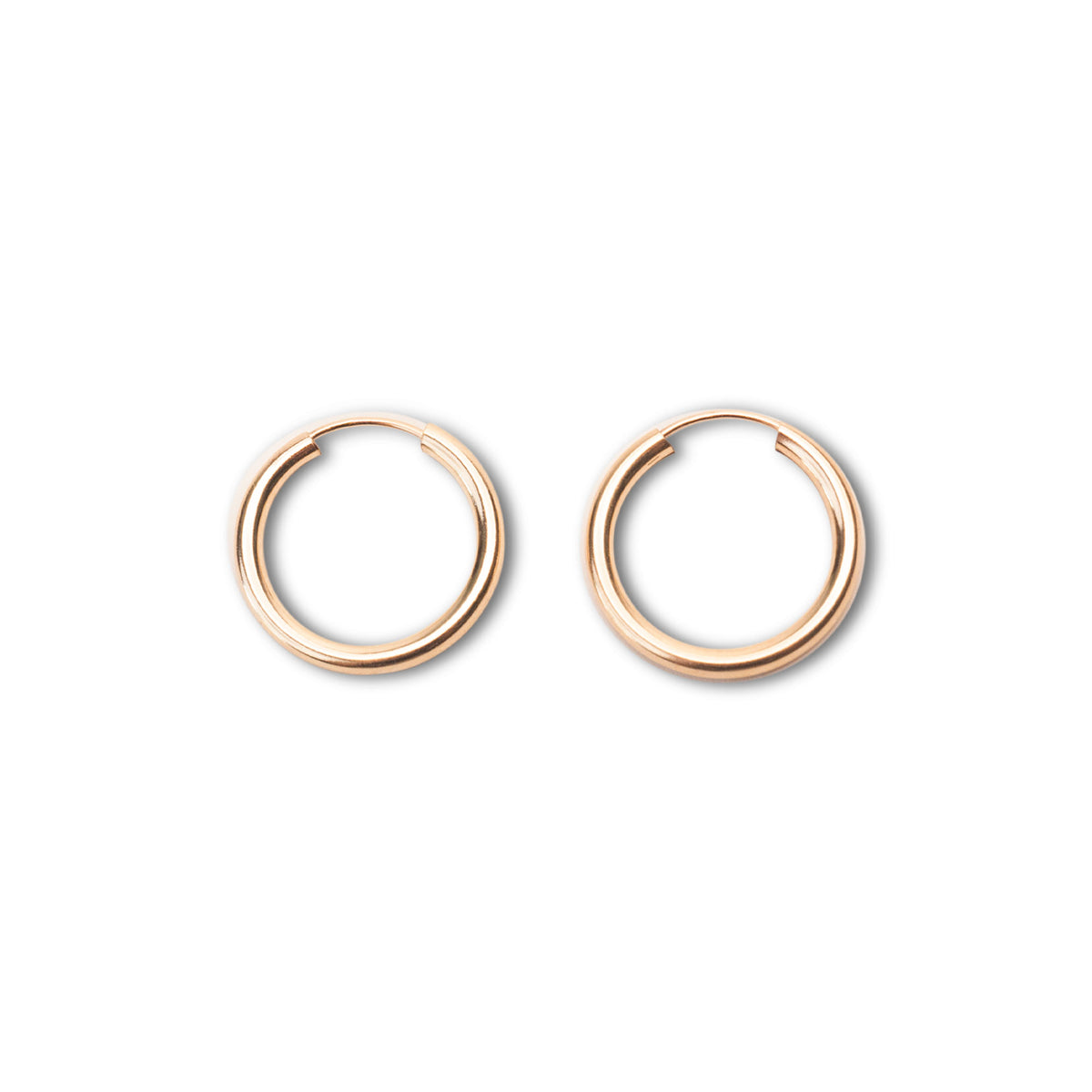 Polished gold endless hoops showing smooth continuous design